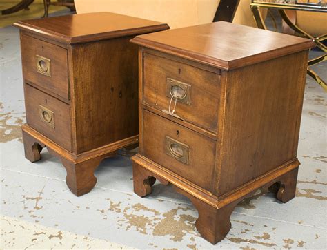 BEDSIDE/LAMP CHESTS, a pair, part 19th century mahogany each fitted with two drawers on bracket ...