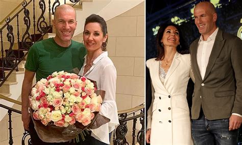 Real Madrid coach, Zinedine Zidane gives flowers to wife Veronique as they celebrate their 25th ...