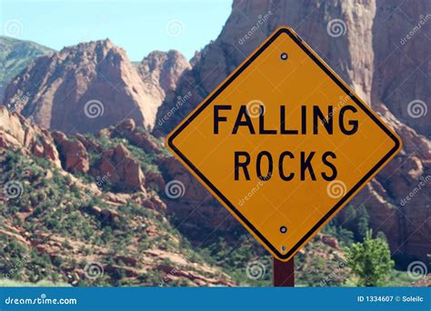 Falling Rocks Ahead Road Sign Royalty Free Stock Photography - Image: 1334607