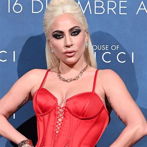 Lady Gaga Sets House of Gucci Red Carpet Ablaze With Fiery Look