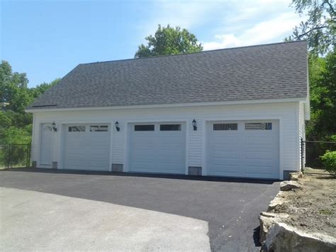 3 Bay Garage with loft and front entry door - Classico - Garage - Manchester - di JWS Custom ...