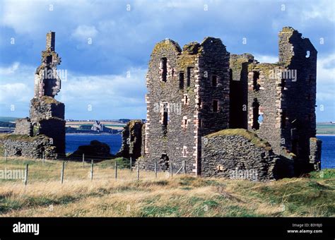 Scotland, Caithness. The ruins of Castle Girnigoe & Castle Sinclair look across Sinclair's Bay ...