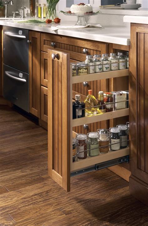 built in spice rack pull out cabinet adjusting shelves | This pull-out spice rack features three ...