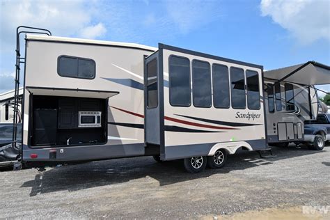 2015 Sandpiper 376BHOK Fifth Wheel by Forest River VIN # 030155 at CamperFactoryOutlet.com