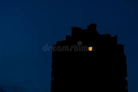 Night View on Old Residential Building Where the Light in on only in ...