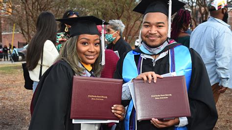 2021 graduates walk the stage Saturday at NC Central and Wake Tech ...