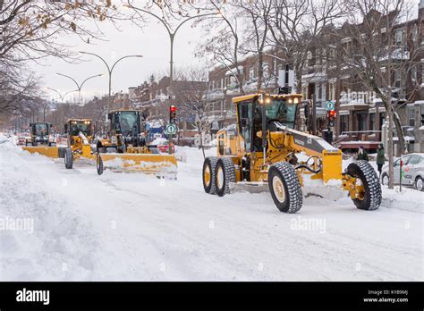 Montreal, CANADA - 13 January 2018: snow plows are clearing snow from the road Stock Photo - Alamy