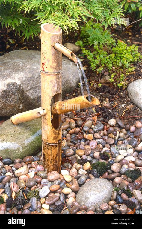 Japanese-style water fountain (shishi odoshi) made from bamboo Stock Photo - Alamy