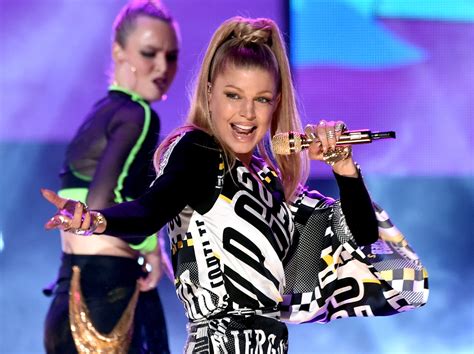 Fergie says she did not leave the Black Eyed Peas - CBS News