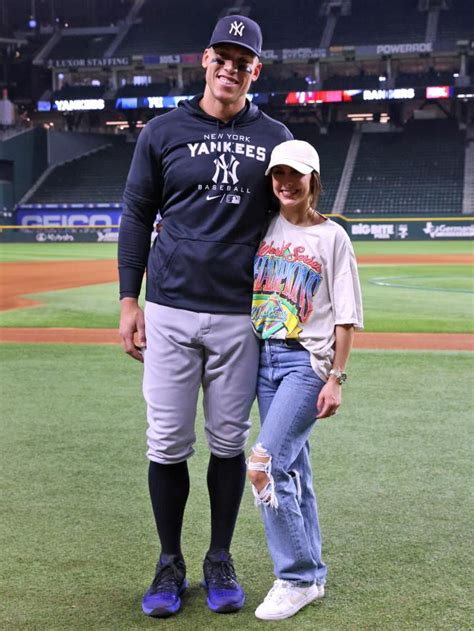 Aaron Judge, wife Samantha Bracksieck hold hands after 62nd home run