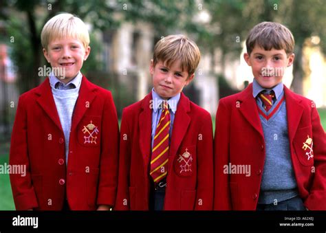 Horizontal shot of young boys age 6 and 8 in traditional school uniforms in York England Stock ...