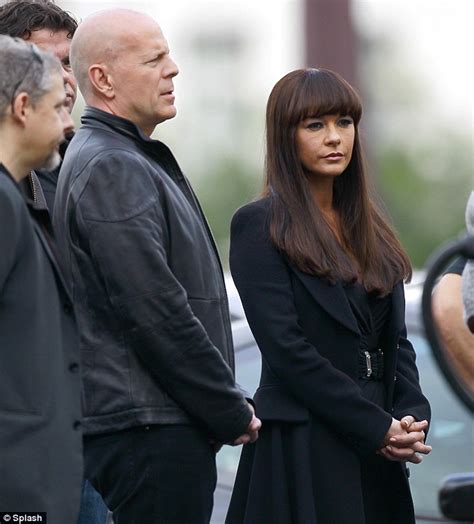 Bruce Willis' wife Emma Heming and baby daughter Mabel visit him on the set of Red 2 in Paris ...