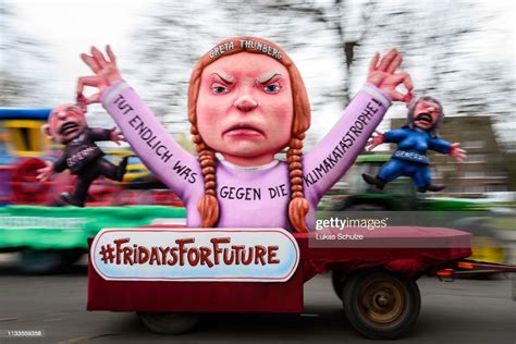 A float featuring an effigy of climate activist Greta Thunberg is... News Photo - Getty Images