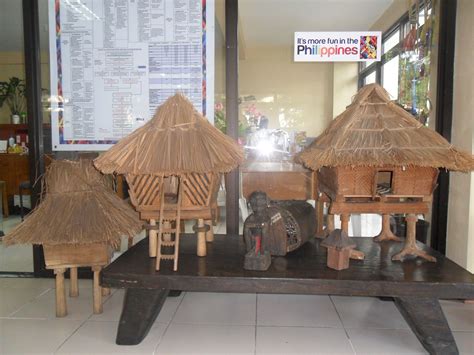 Miniature houses of the indigenous people of the Cordillera at the Department of Tourism. Baguio ...