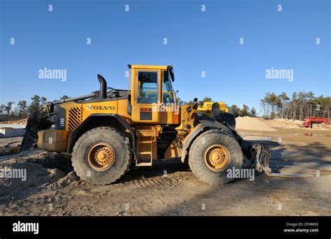 Volvo front end loader on construction site USA Stock Photo - Alamy