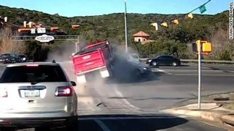 Terrifying dump truck crash caught on camera - CNN Video