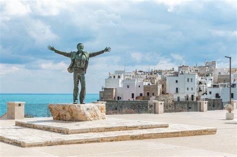 Bronze Statue of the Italian Singer Domenico Modugno in Polignano a ...