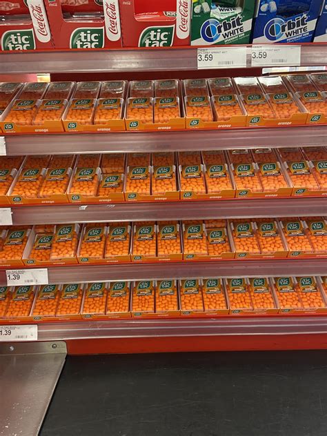 This amount of orange tic-tacs being sold at this checkout aisle : r/mildlyinteresting