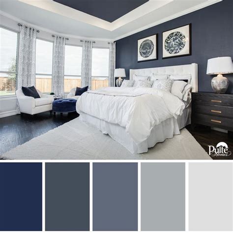 This bedroom design has the right idea. The rich blue color palette and ...