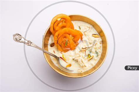 Image of Rabri Jalebi Or Imarati With Rabdi Made From Condensing Milk ...