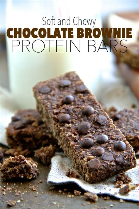 soft and chewy chocolate brownie protein bars . - . running with spoons