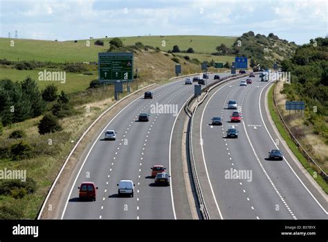 Traffic driving on a dual carriageway road A27 highway in West Sussex England Stock Photo - Alamy