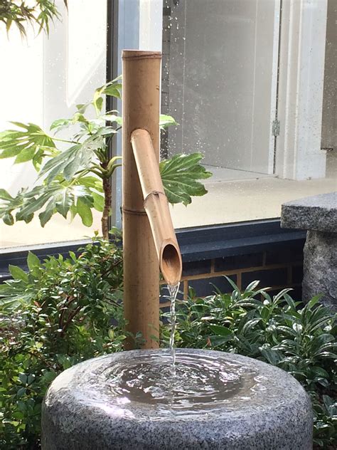 Traditional water feature | Bamboo water fountain, Japanese garden ...