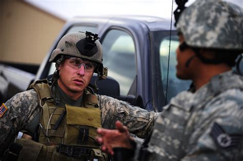 A U.S. soldier, left, assigned to Alpha Company, 4th Battalion, 10th Special Forces Group ...