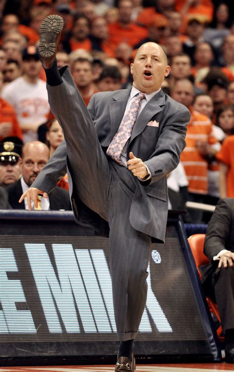 Write your own caption: Marquette coach Buzz Williams kicks at Syracuse ...