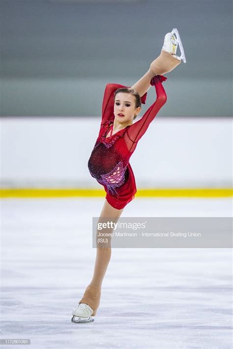 Daria Usacheva of Russia competes in the Junior Ladies Free Skating... | Figure skating dresses ...