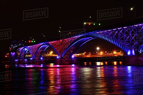 View at night of the Peace Bridge - Stock Photo - Dissolve