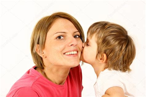 Baby girl kissing her mom — Stock Photo © macniak #3974409