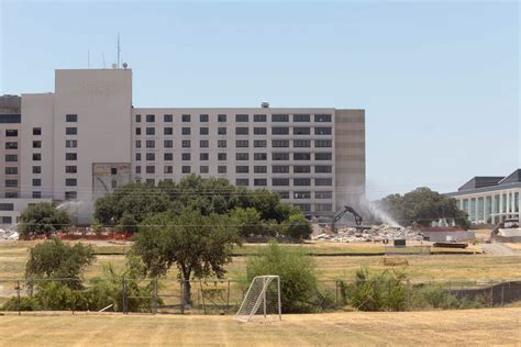 Old Wilford Hall hospital tower being razed piece by piece