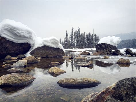 Snowy rocks at Lake Wenatchee in Lake Wenatchee State Park. Photo by ...