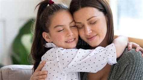 Happy Young Mother and Small Daughter Hug Showing Love Stock Photo ...