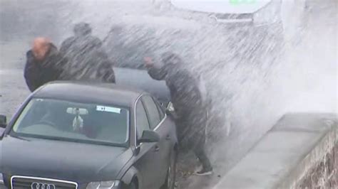 Storm Agnes: Stormgazers get too close for comfort as waves crash over them | Weather News | Sky ...