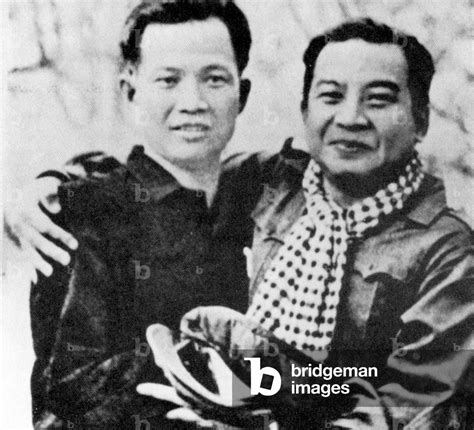 Image of Cambodia: Wearing Khmer Rouge garb, Norodom Sihanouk embraces ...