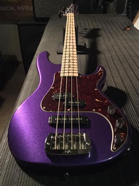 An SB-2 in Royal Purple Metallic, tortoise guard, maple neck with Clear Satin finish, body color ...