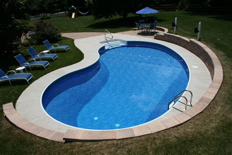 Pin by Regina Pools & Spas on Backyard Paradise | Kidney shaped pool ...