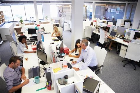 Premium Photo | People working in a busy office