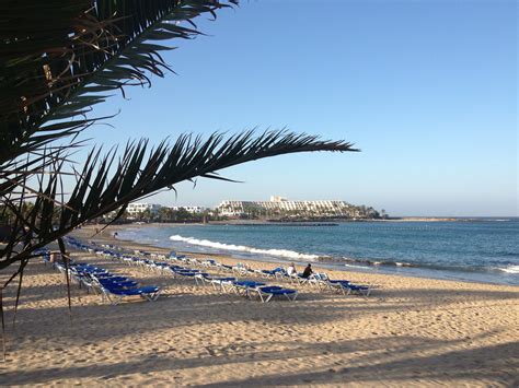 the beach at costa teguise | Places to travel, Lanzarote, Travel