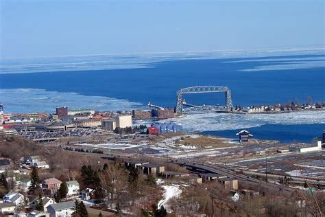 Lake Superior partly frozen over with Duluth Harbor Photograph by Ernie Engebretson - Fine Art ...