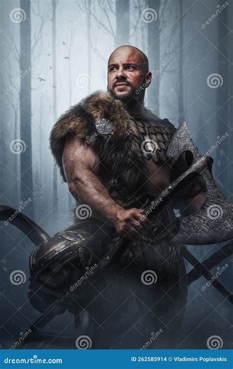 Barbaric Viking with Two Axes in Forest in Snowfall Stock Photo - Image of horned, male: 262585914