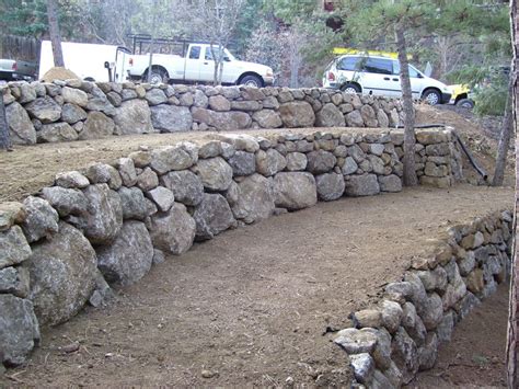 Broadmoor Boulder Retaining Walls | Fredell Enterprises | Landscaping ...