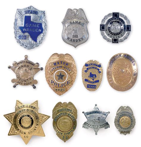 A GROUP OF FIFTEEN LAW ENFORCEMENT BADGES | Christie's