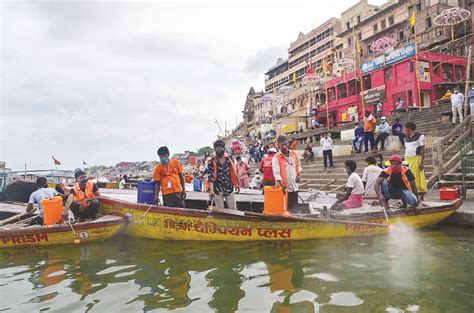 National Mission for Clean Ganga workers spray bioremediation solution ...