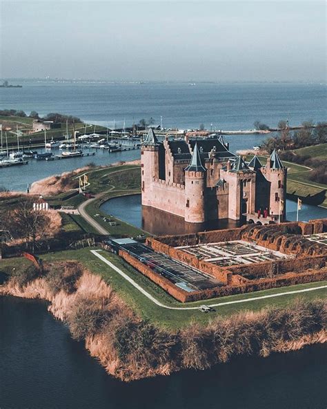 Muiderslot castle on a beautiful day. The castle itself is amazing but the area around it makes ...