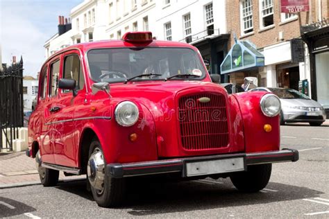 Old red taxi in London stock photo. Image of england - 20260084