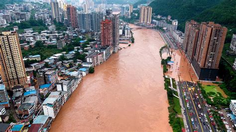 Over 100,000 people evacuated amid heavy rain and flooding in SW China ...