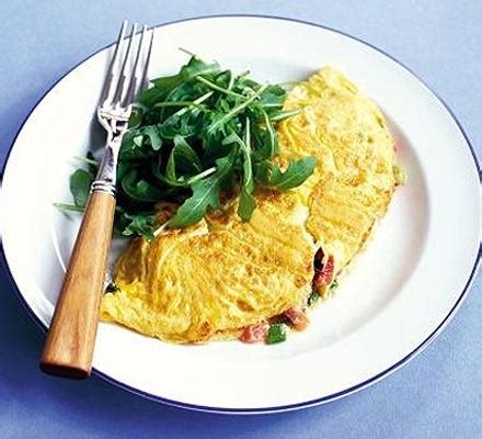 Melting tomato & basil omelette recipe | BBC Good Food